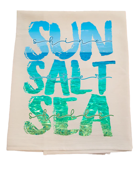 Beige towel with blue and green text 'Sun Salt Sea' on a white background