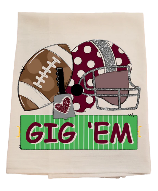 Decorative towel with football, helmet, and 'GIG 'EM' text on a white background